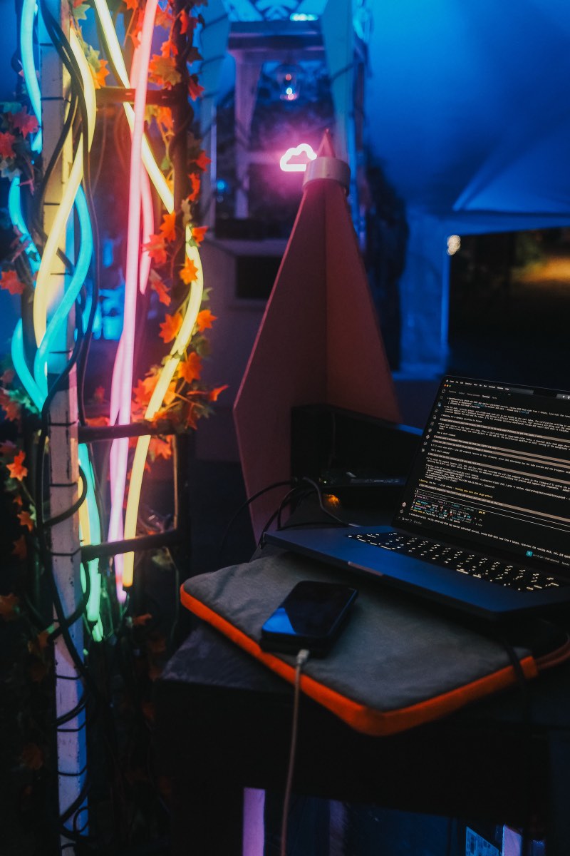 Laptop running the control software beside the illuminated central structure